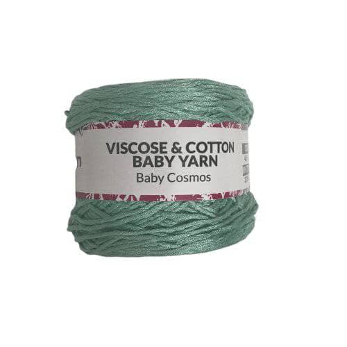 Viscose & Cotton Baby Yarn cake in Baby Cosmos (green) on a white background