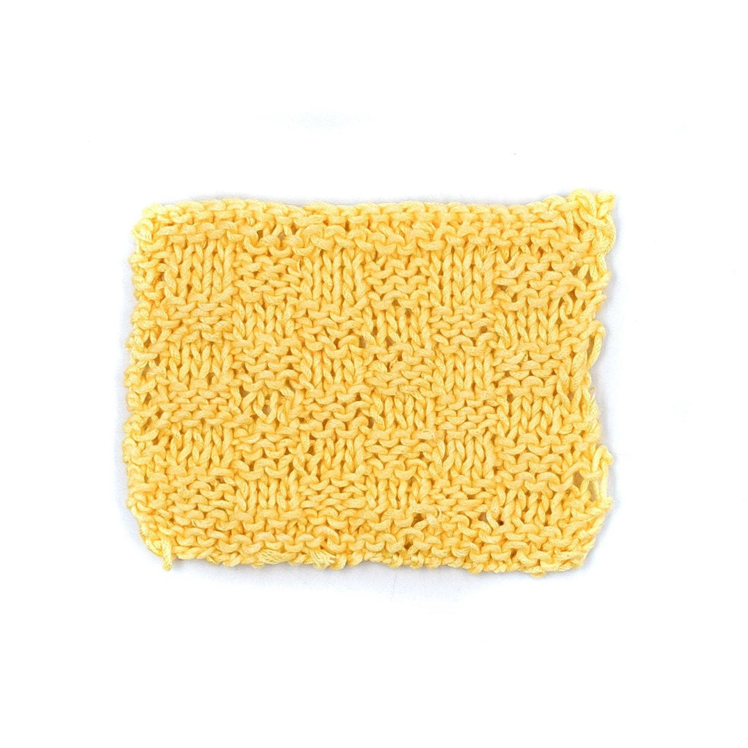 Sample knitted swatch of daffodil on a white background