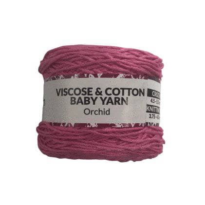 Viscose & Cotton Baby Yarn cake in Orchid (pink) on a white background