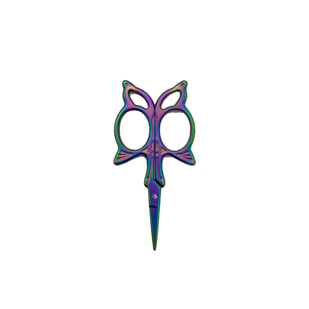 Craft scissors with a butterfly design to its build. Color is a mix of purple, pink, and green.