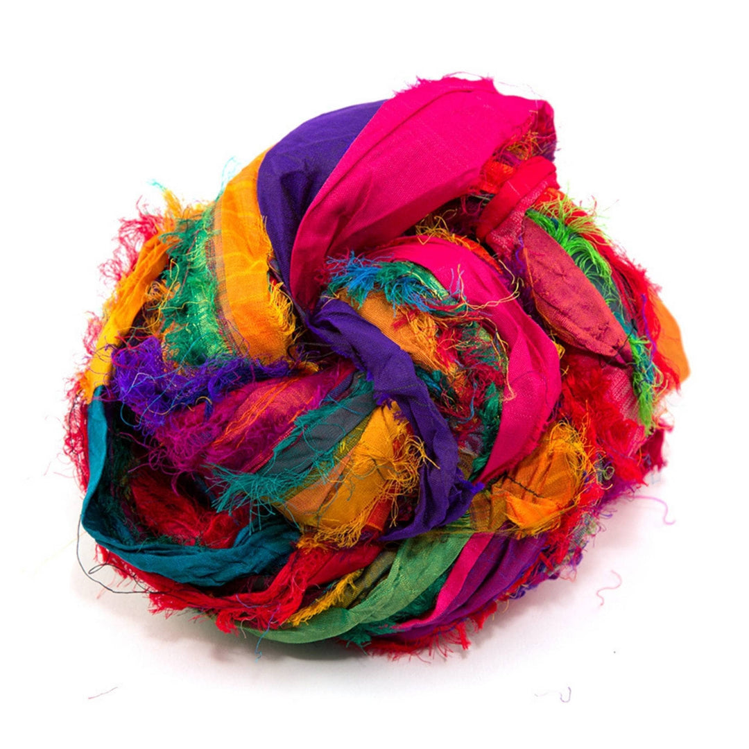 textured multicolor reclaimed ribbon yarn in front of a white background.